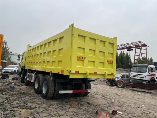 Utilisé HOWO SINOTRUK camion à ordures 8x4 de seconde main HOWO 375 HP camion à remontage à vendre